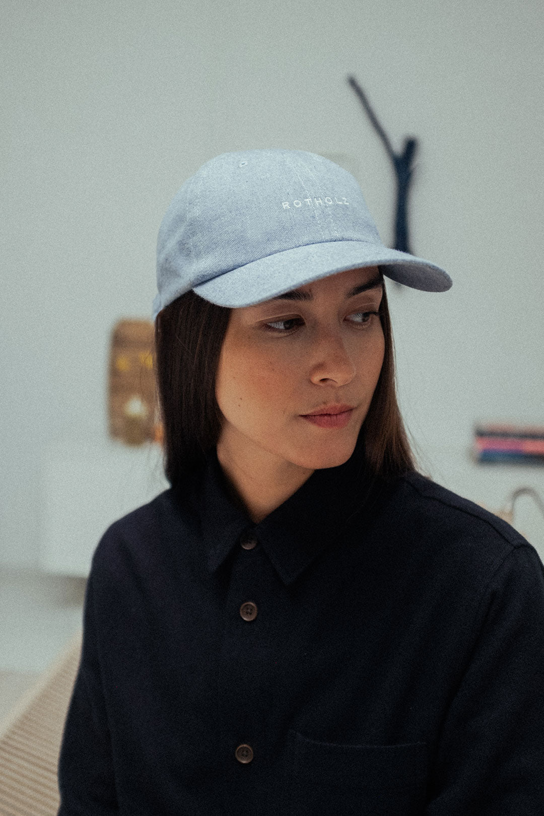 Blue-grey cap logo made of 100% organic cotton from Rotholz