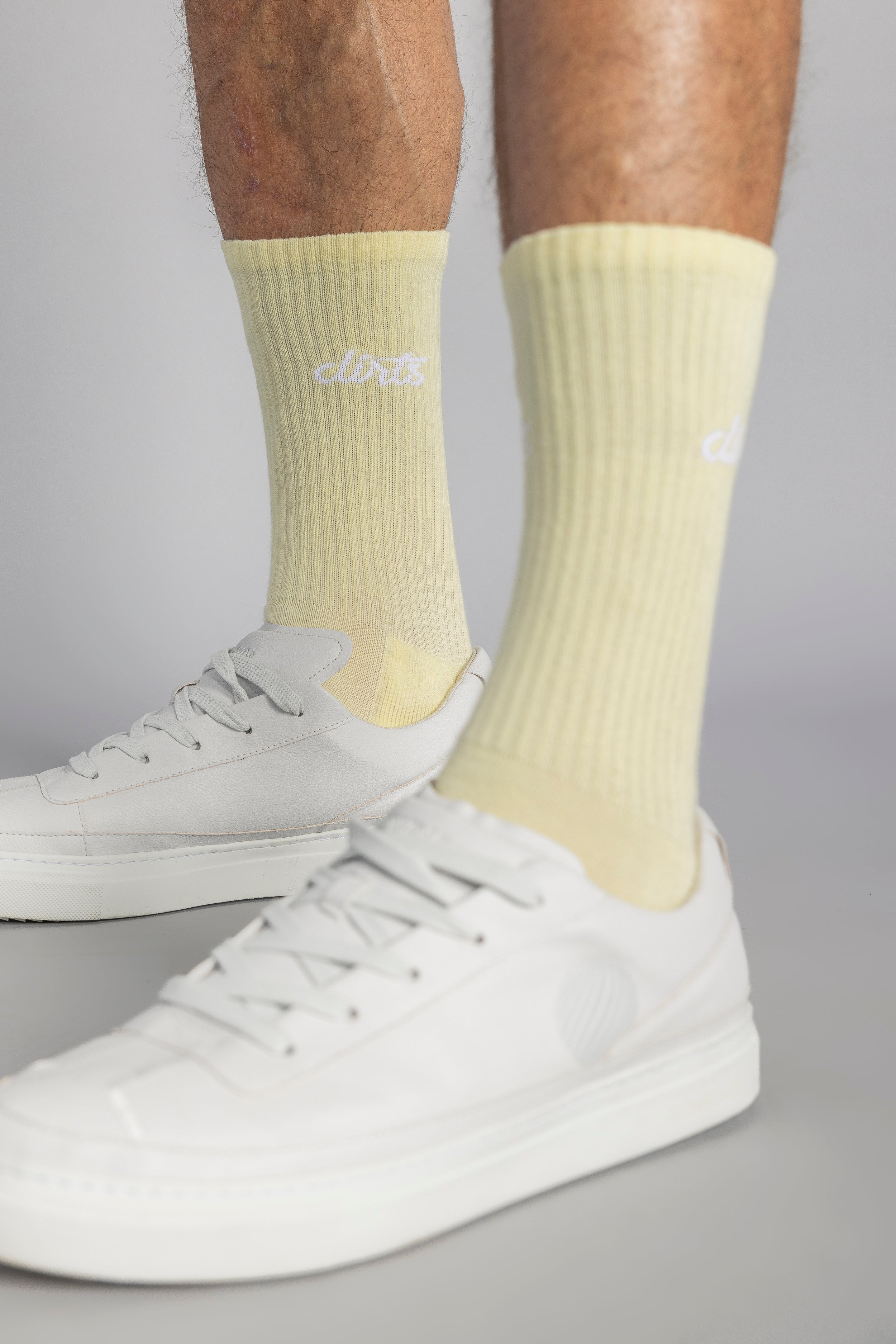 Yellow Classic Logo socks made of organic cotton from DIRTS