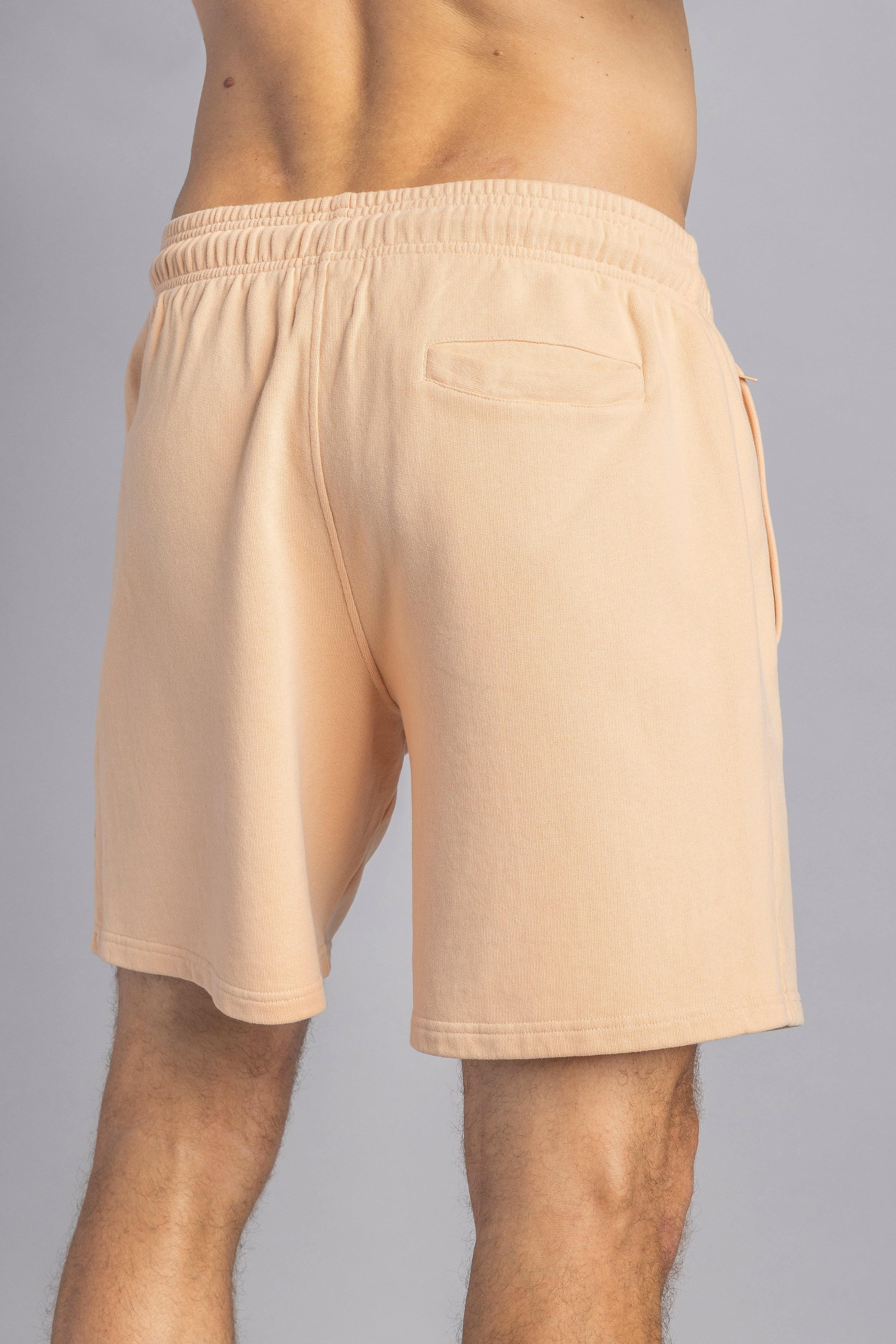 Light orange sweat shorts made from 100% organic cotton from DIRTS