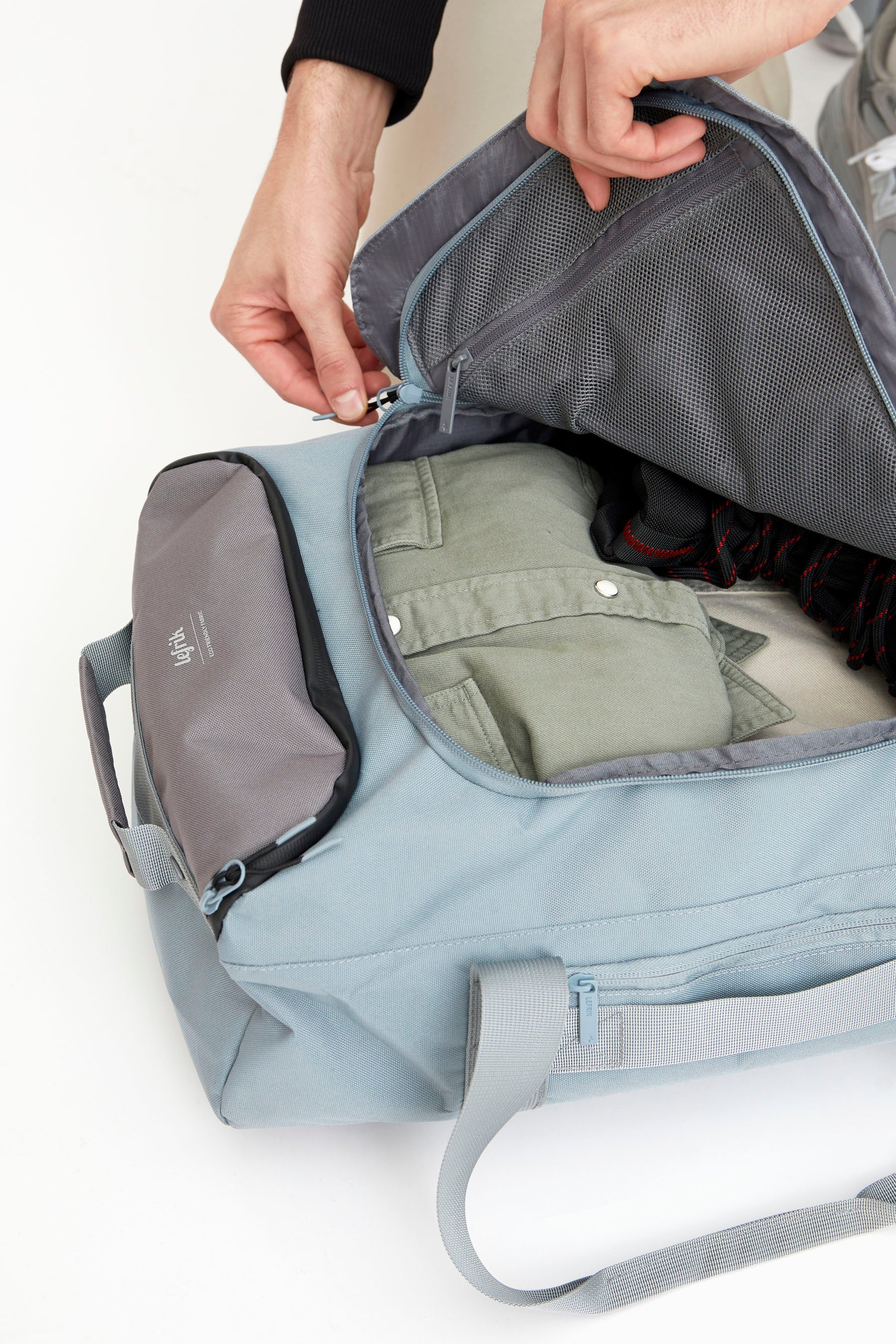 Light blue Wanderer travel backpack made from recycled PET from Lefrik