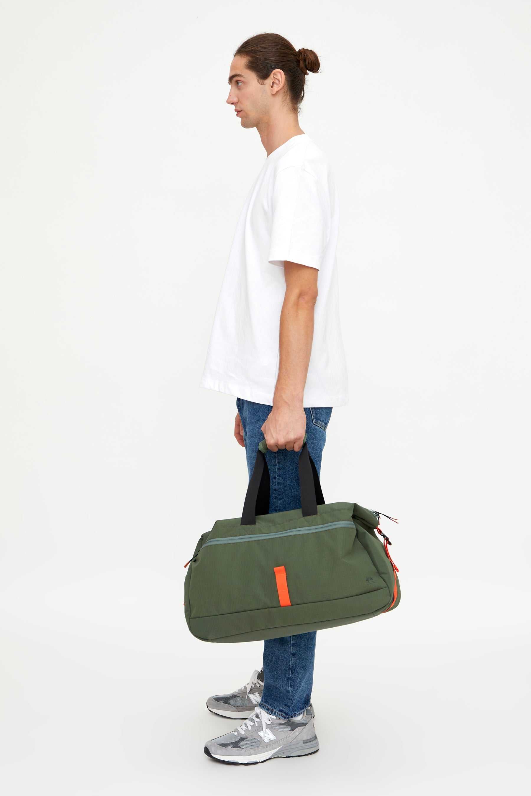 Green Vandra travel bag made from recycled PET from Lefrik