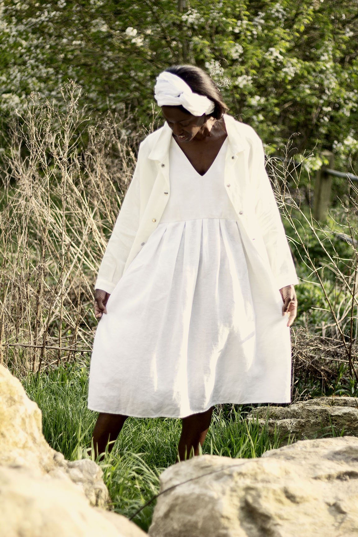 Apron dress in white made from 100% linen