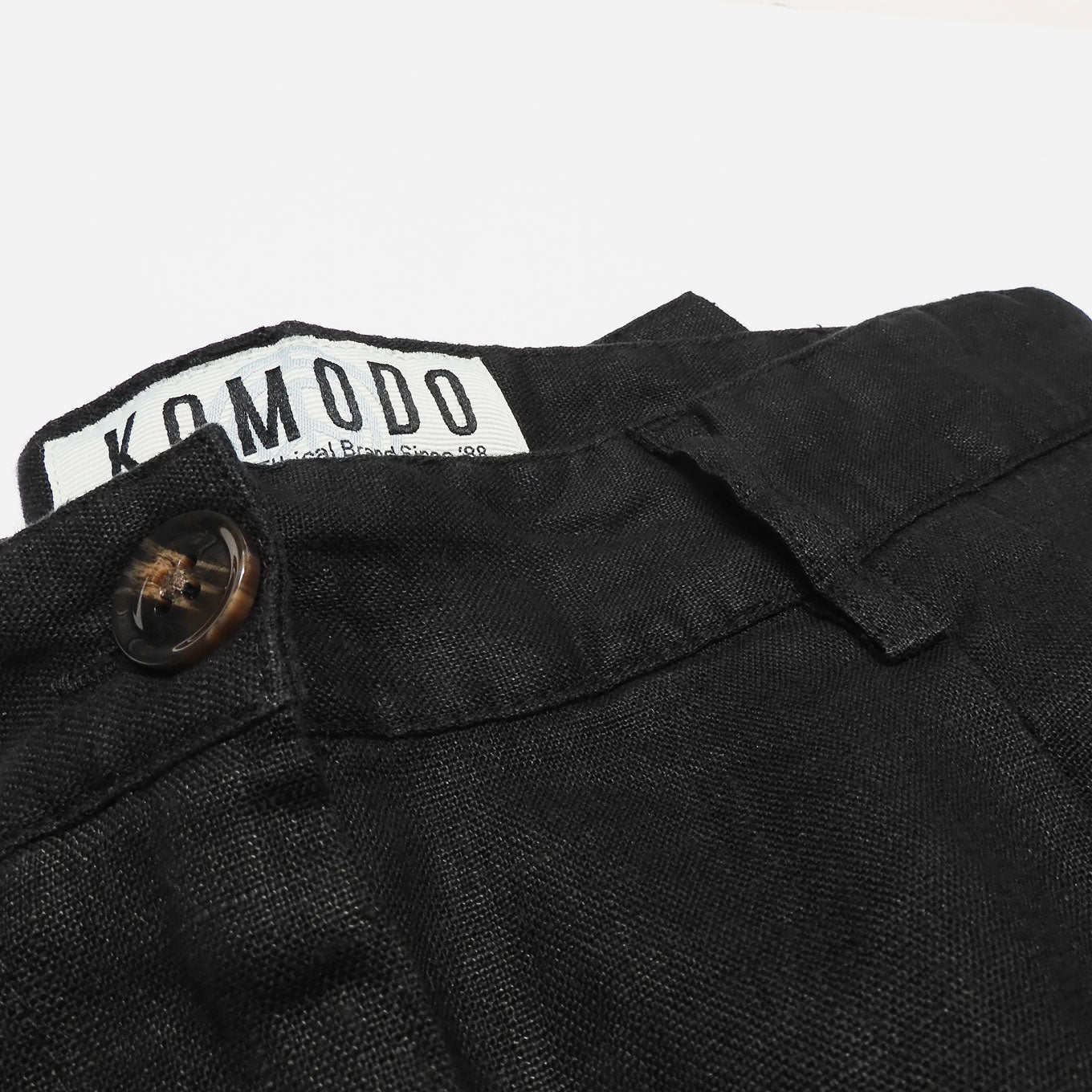 Black LION trousers made from organic linen by Komodo