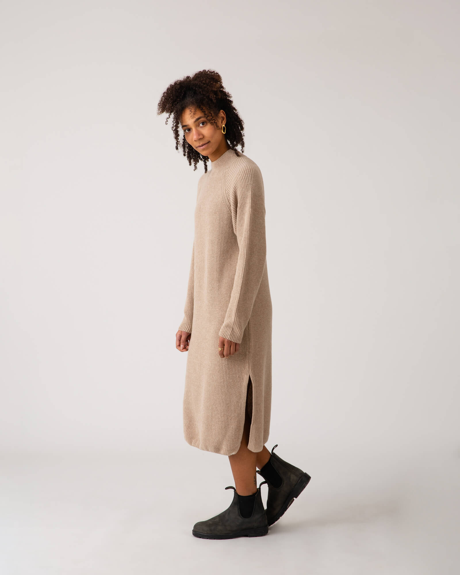 Light brown, knitted limestone dress made from recycled wool by Matona