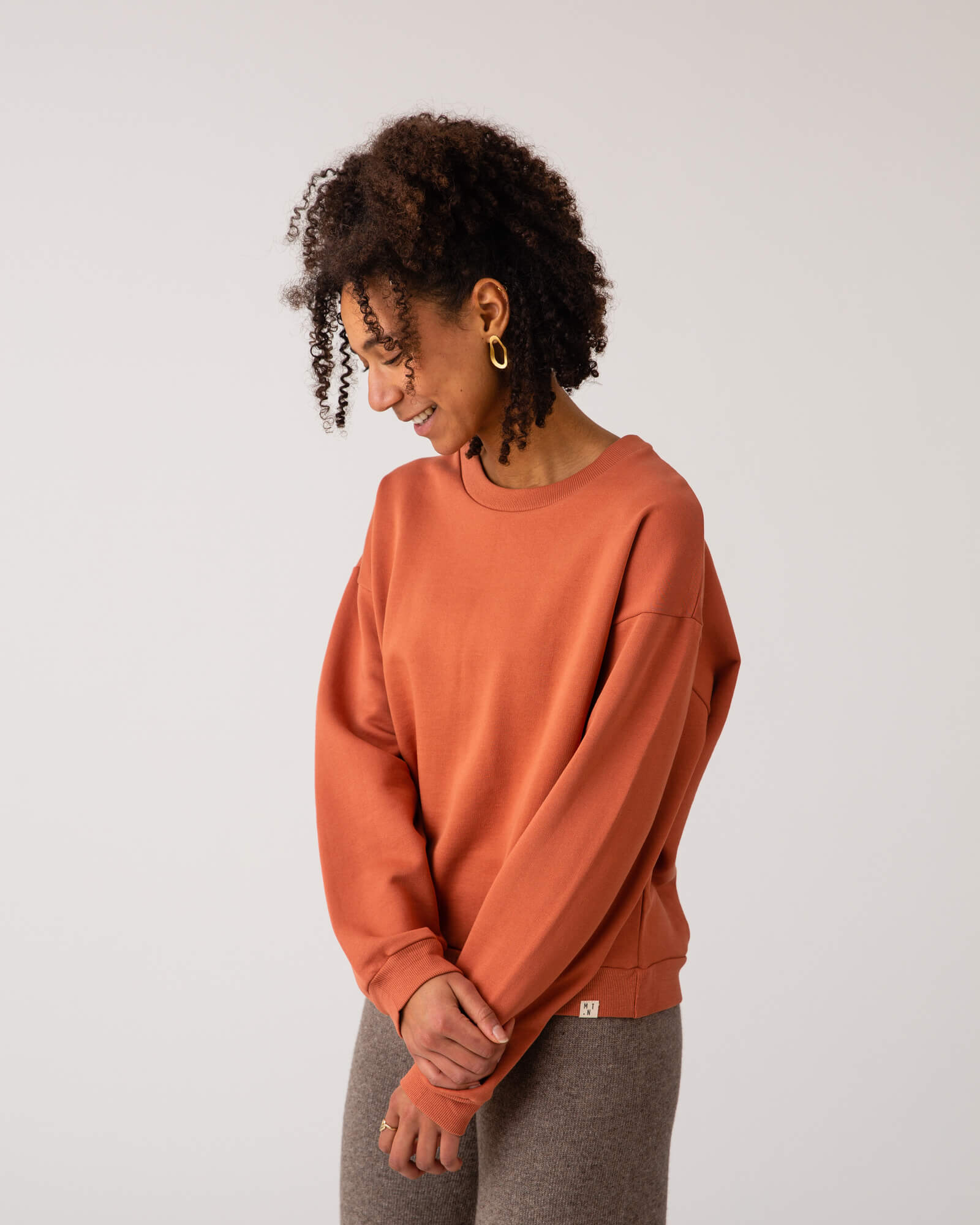 Orange long-sleeved cider sweatshirt made of organic cotton from Matona