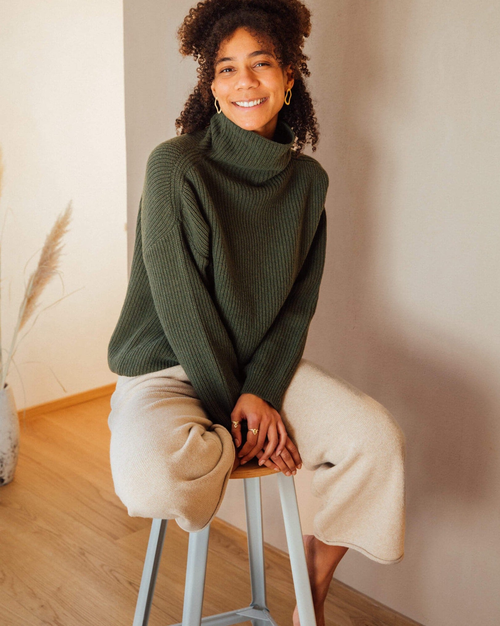Loden green turtleneck sweater from Matona made from recycled wool blend