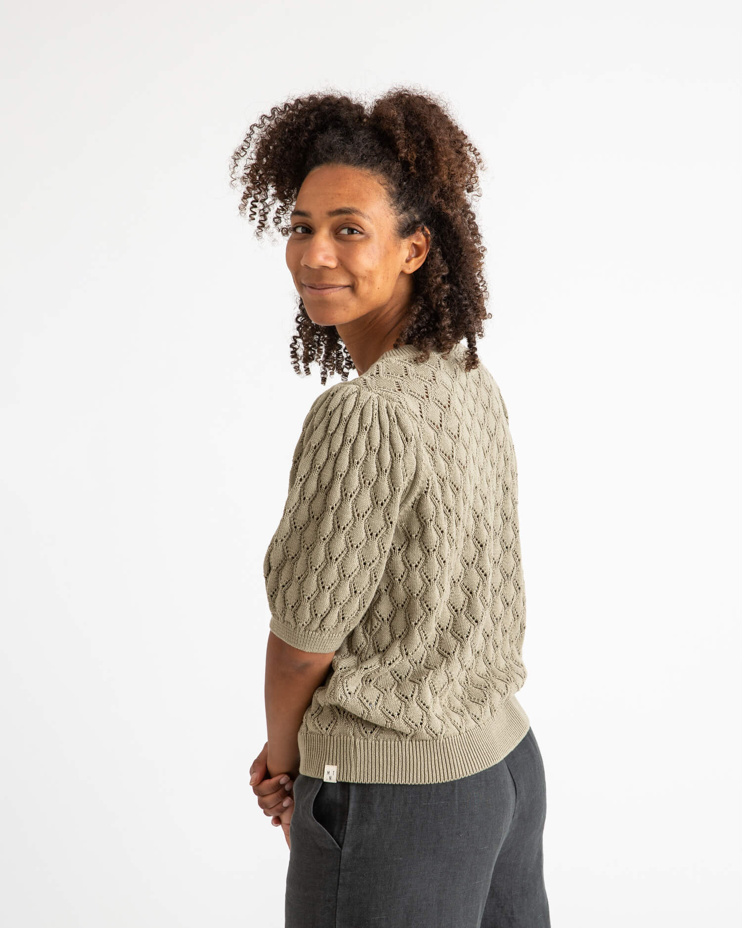 Green, knitted blouse made from 100% organic cotton by Matona