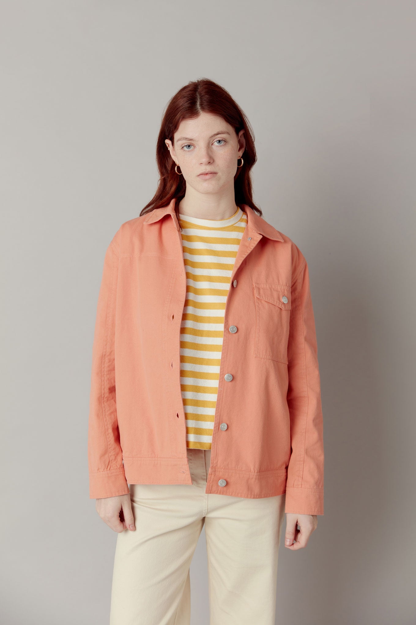 Orange jacket Orino made from 100% organic cotton from Komodo