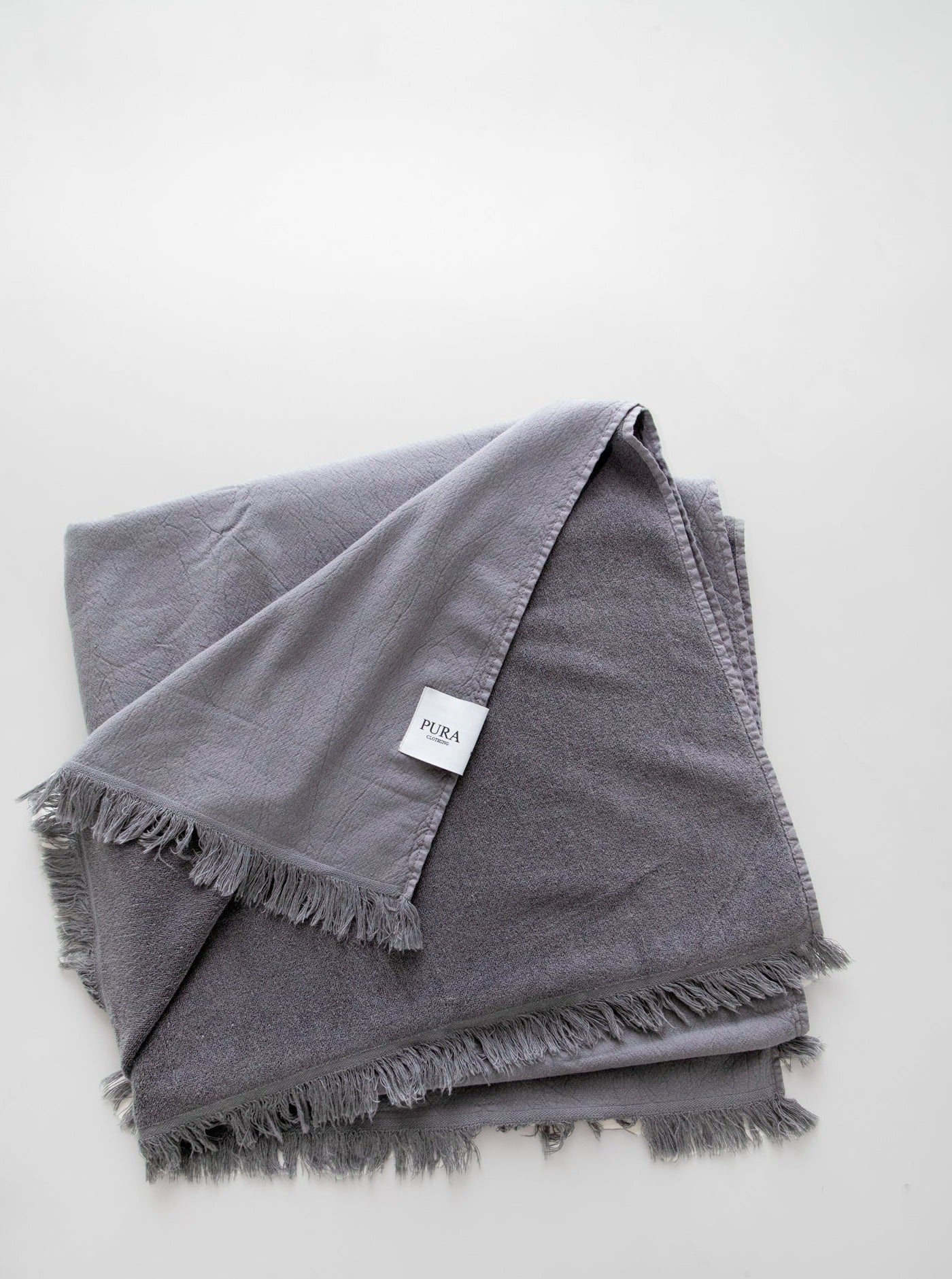 Gray beach towel made from 100% organic cotton from Pura Clothing