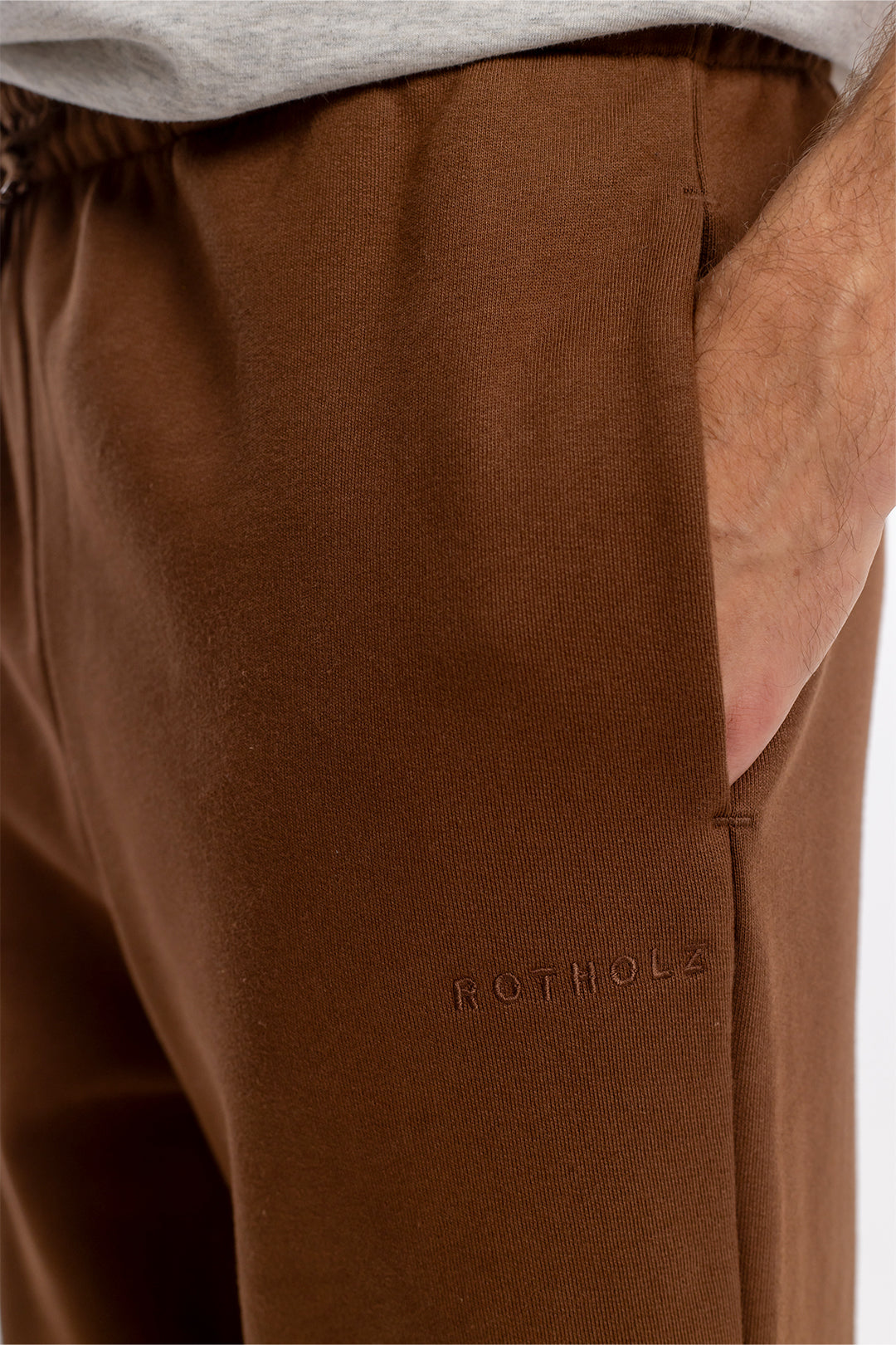 Dark brown logo jogging pants made of organic cotton by Rotholz