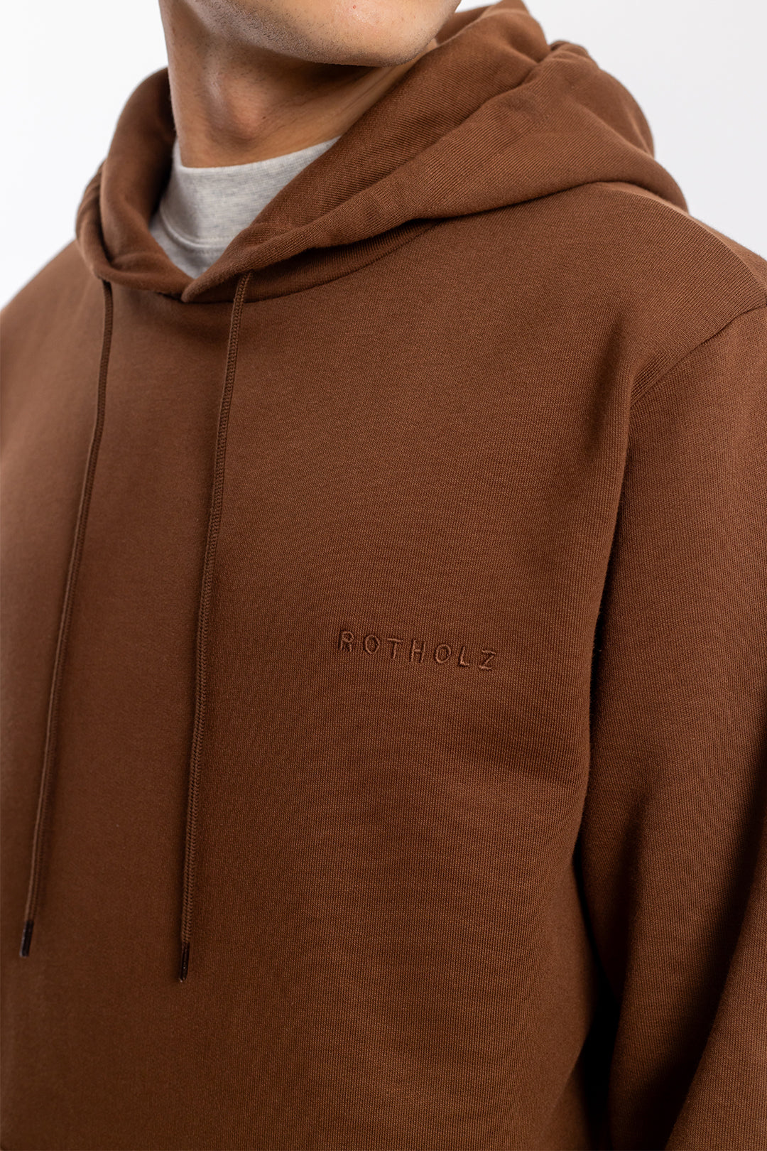 Dark brown logo hoodie made of organic cotton by Rotholz