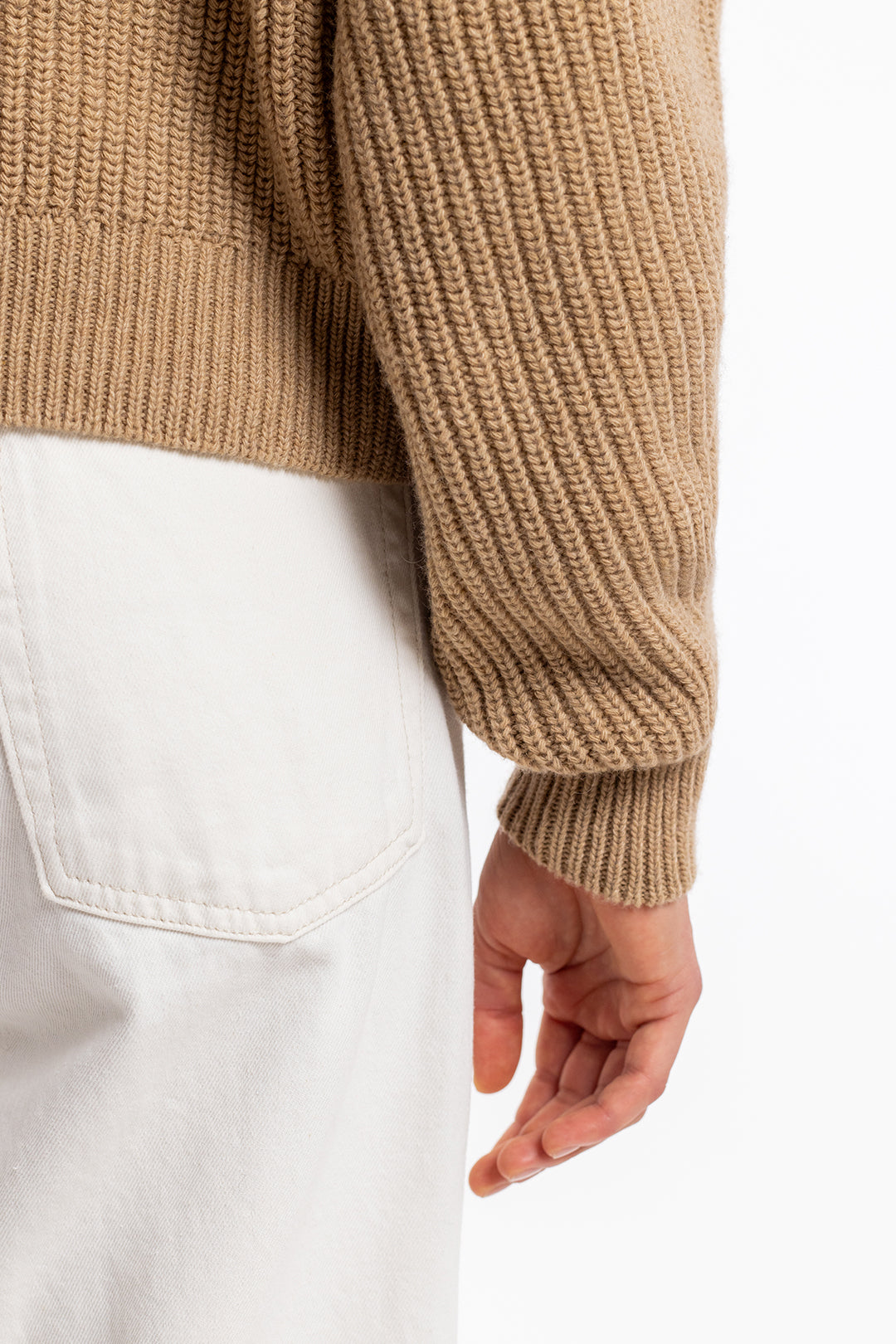 Beige knitted sweater made from recycled wool from Rotholz