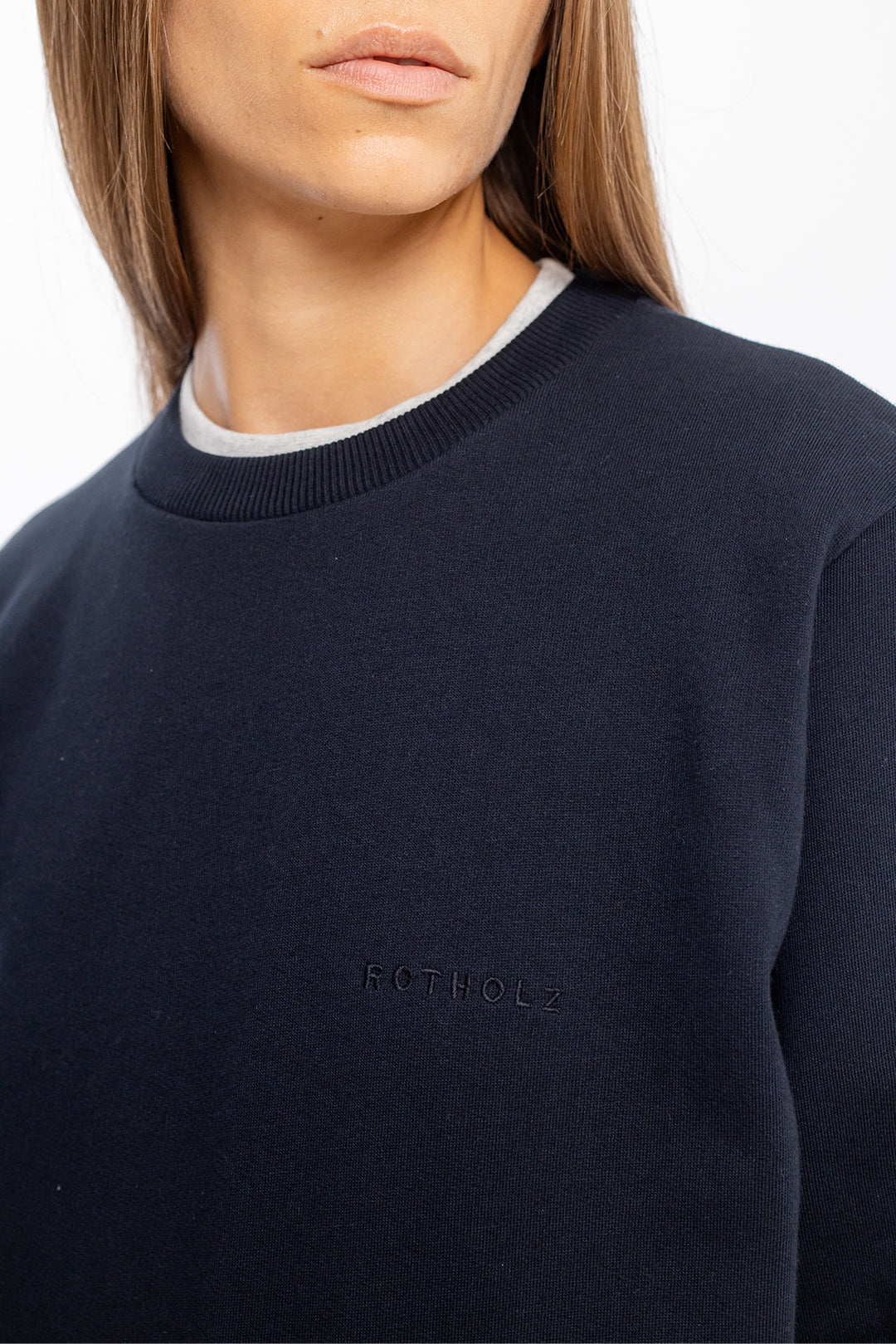 Black sweater logo made of organic cotton from Rotholz