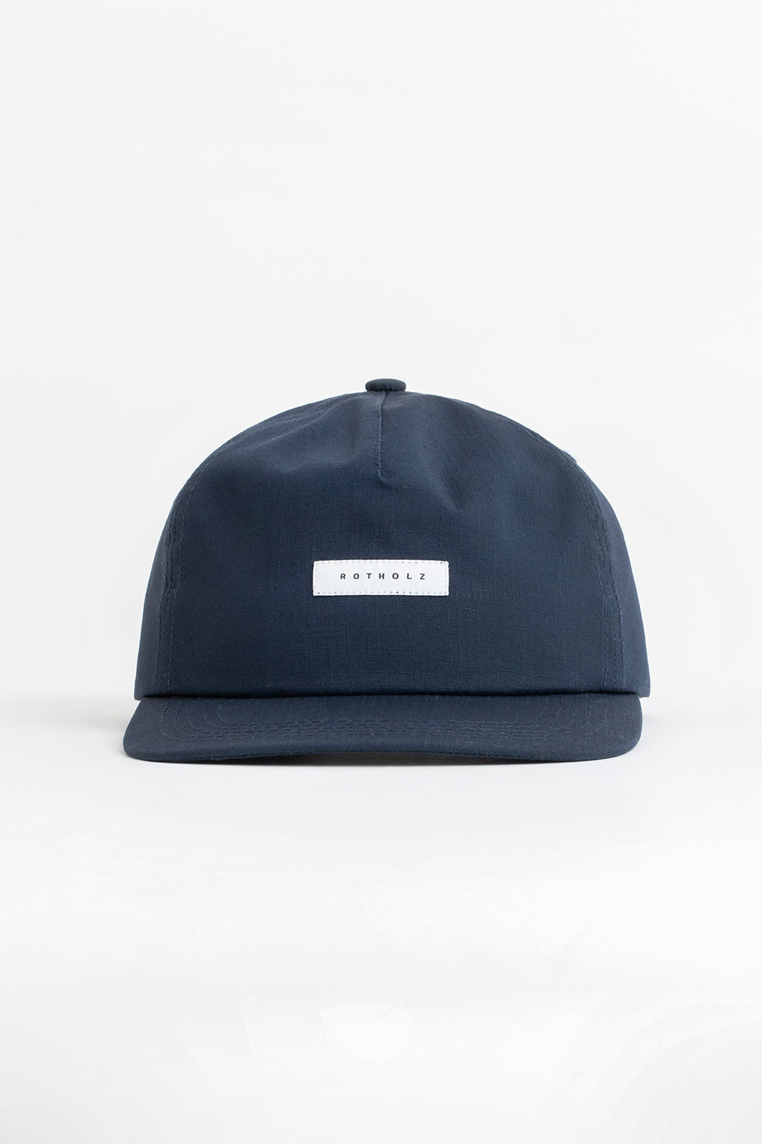 Dark blue floppy cap made of organic cotton from Rotholz