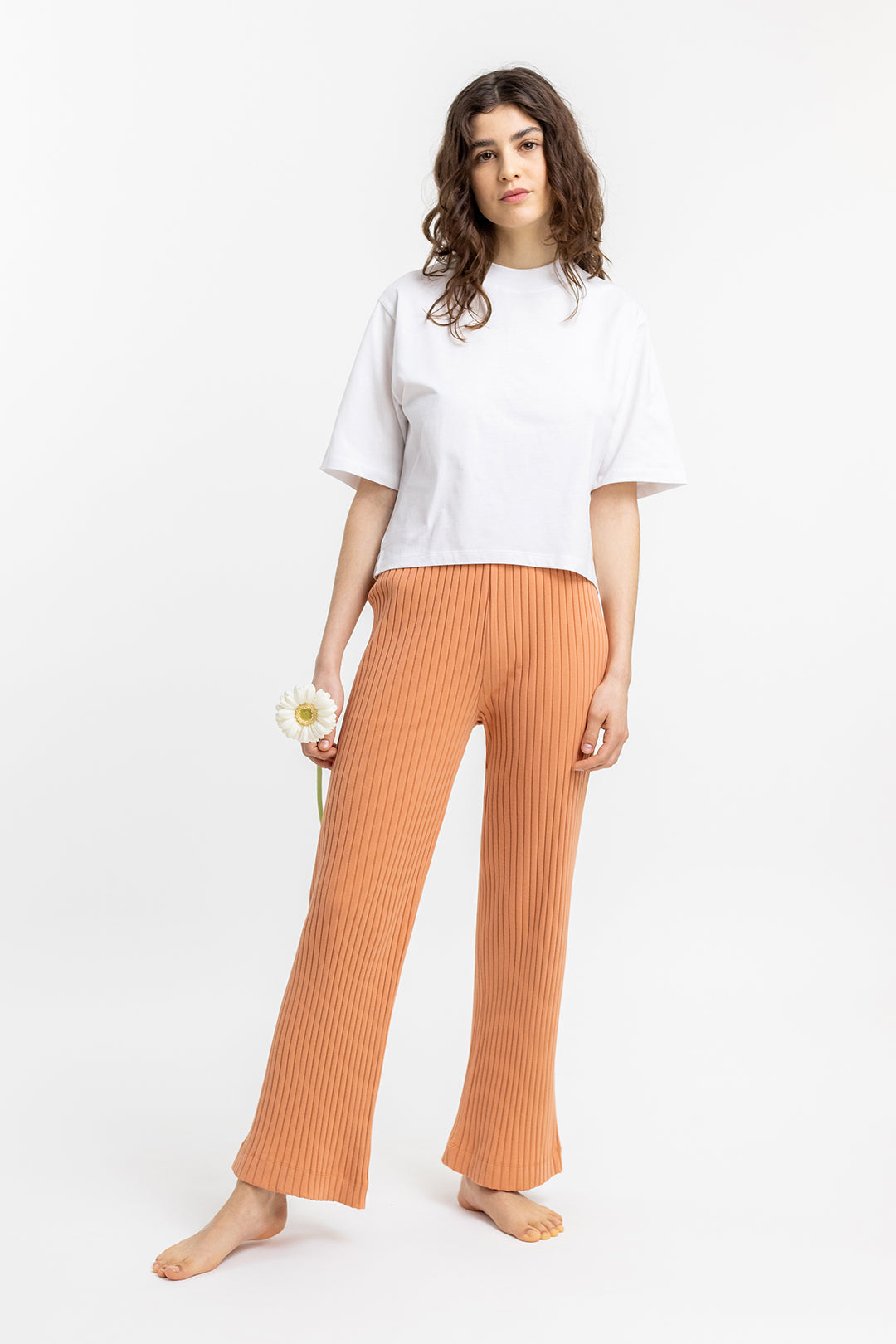 Orange, ribbed Lounge trousers made from organic cotton by Rotholz