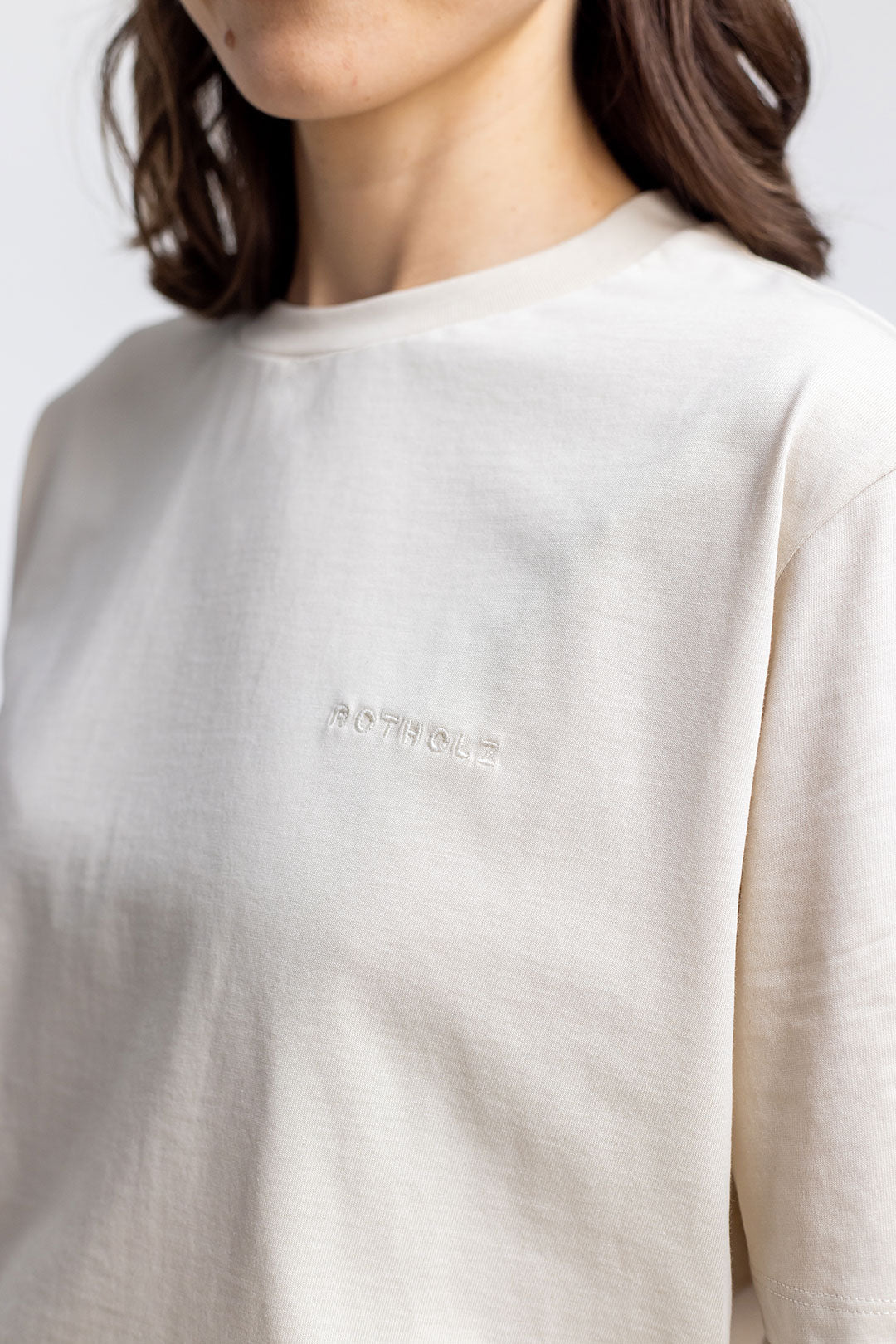 Beige T-shirt logo made from 100% organic cotton from Rotholz