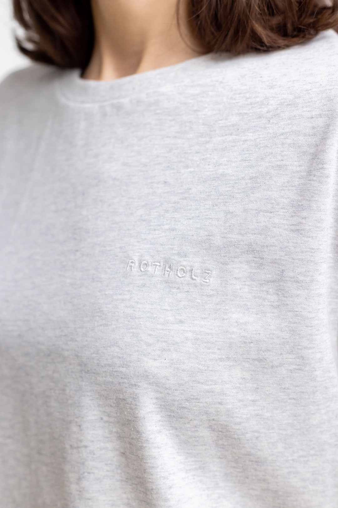 Light gray T-shirt logo made from 100% organic cotton from Rotholz