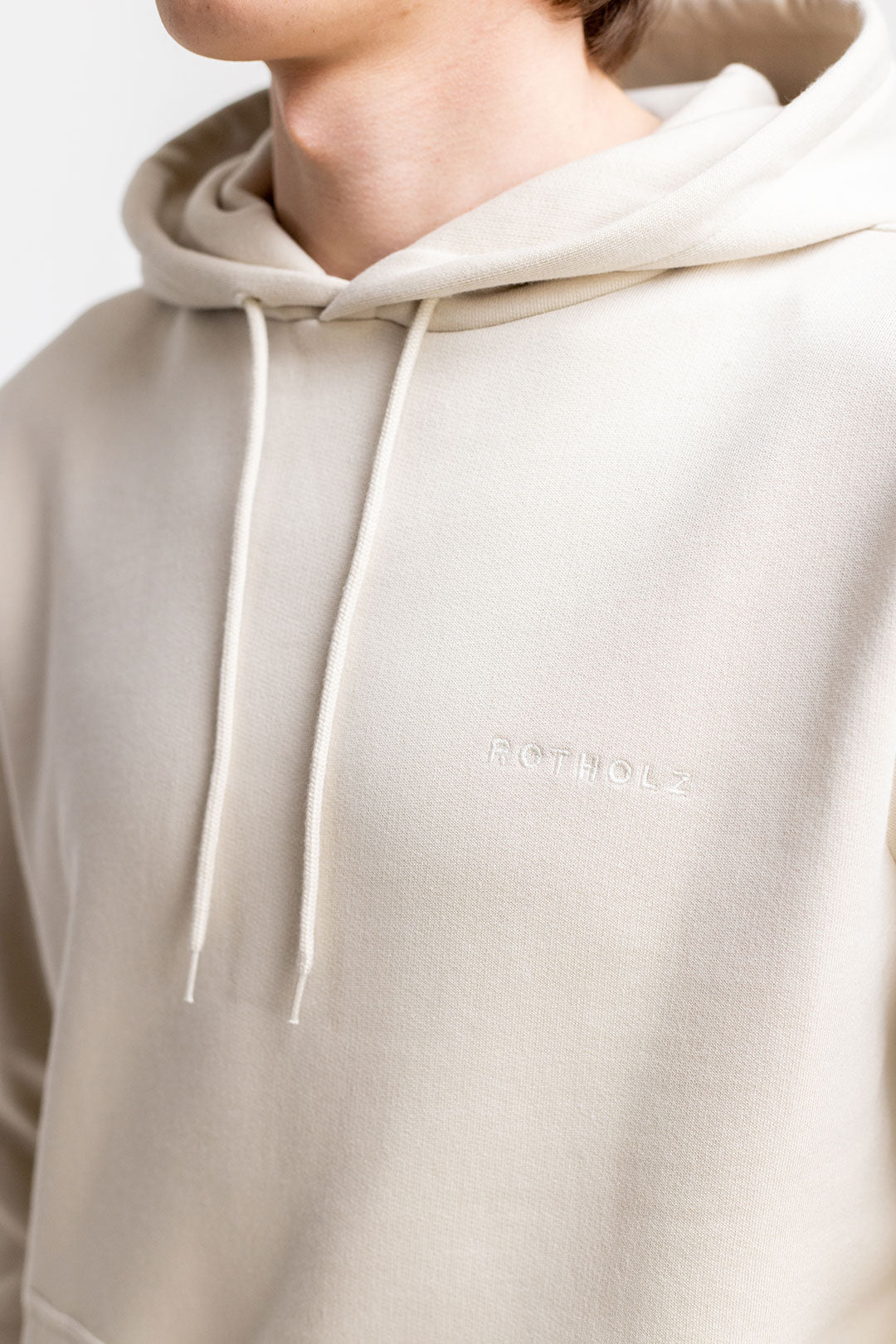 Beige hoodie logo made of 100% organic cotton from Rotholz