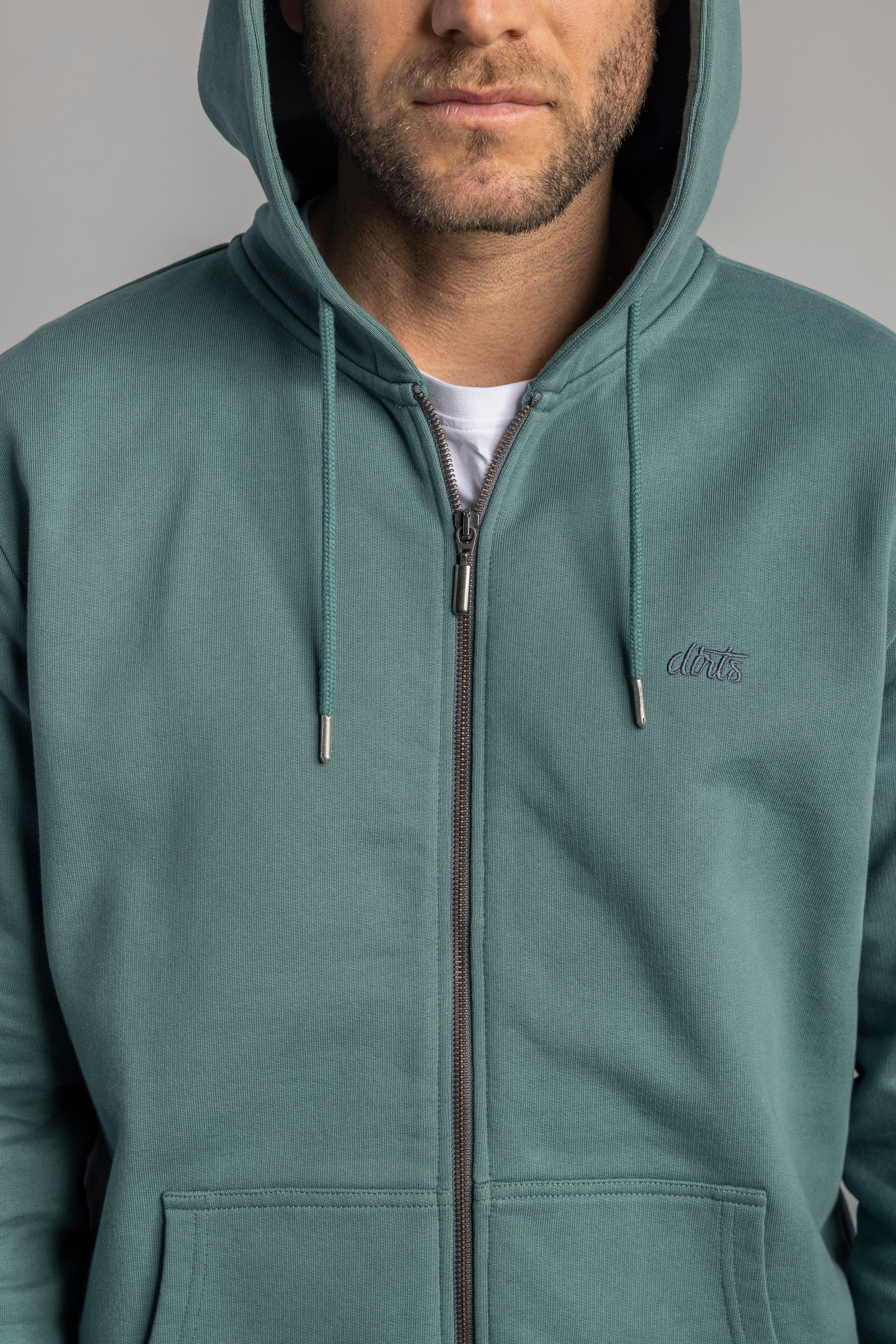 Green zip hoodie made from 100% organic cotton from DIRTS