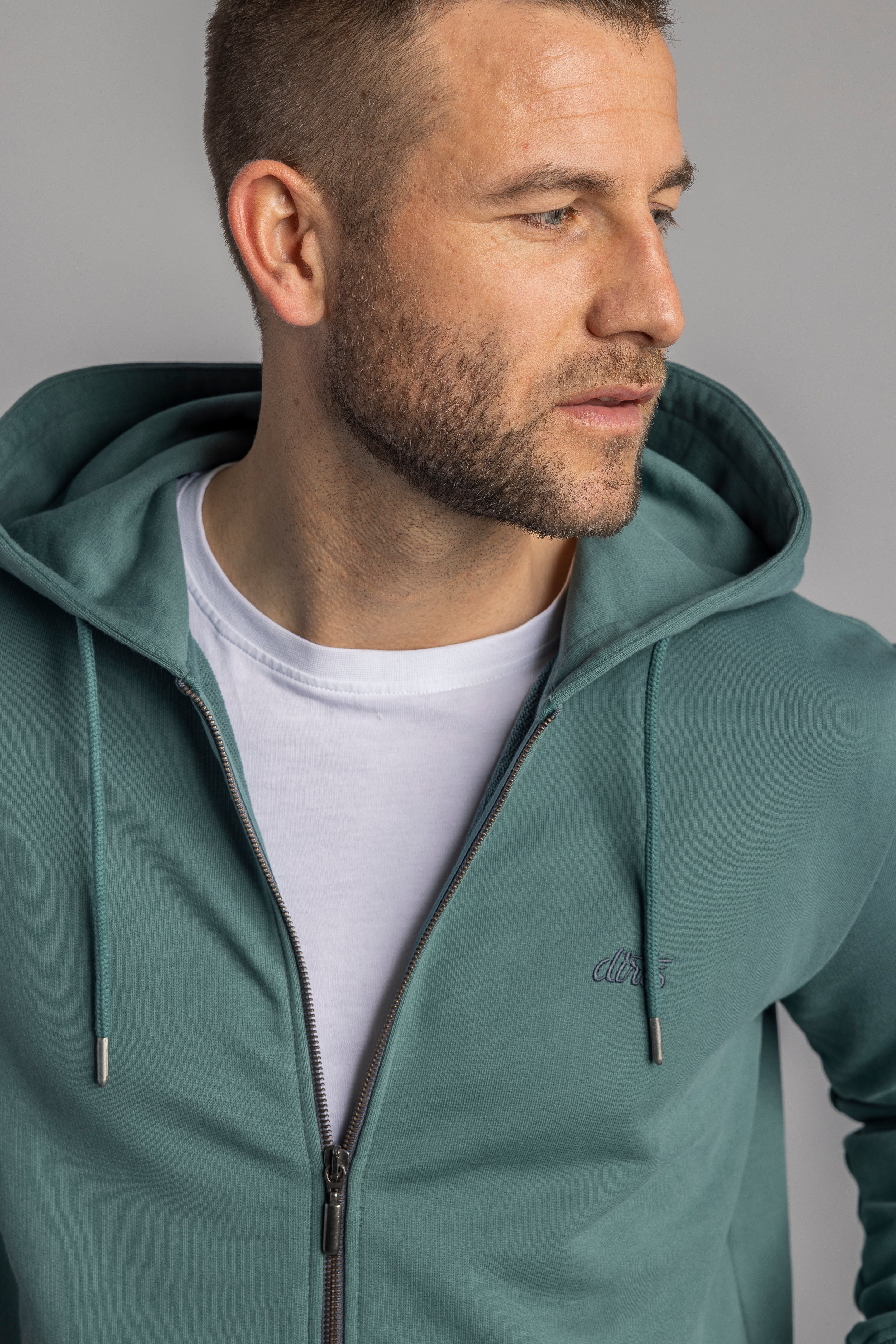 Green zip hoodie made from 100% organic cotton from DIRTS