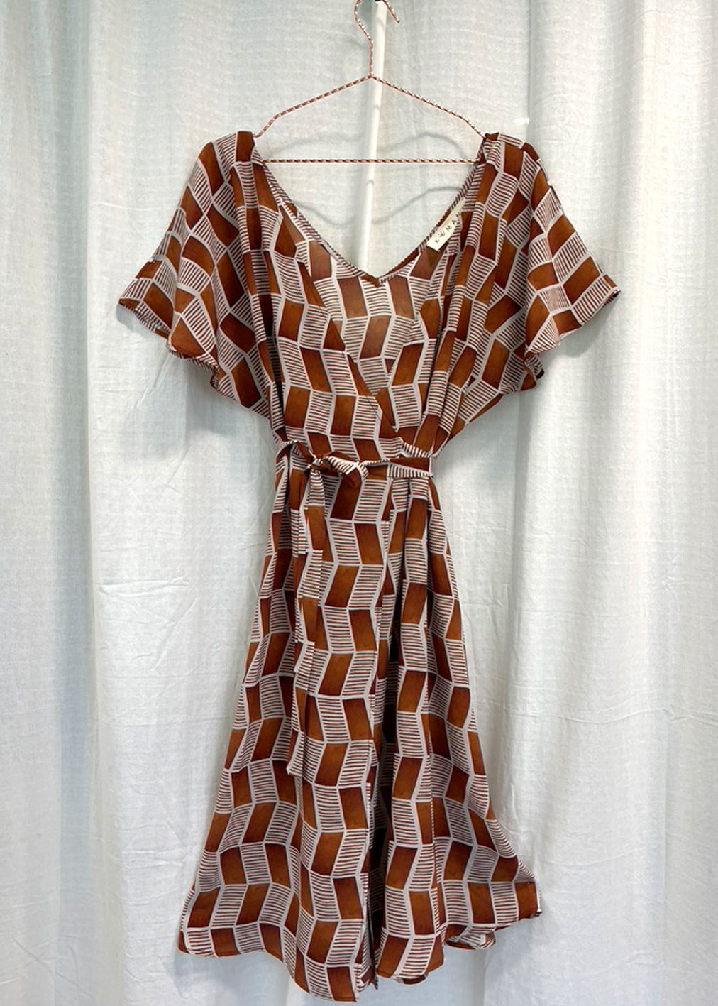 Astra wrap dress in caramel made of silk