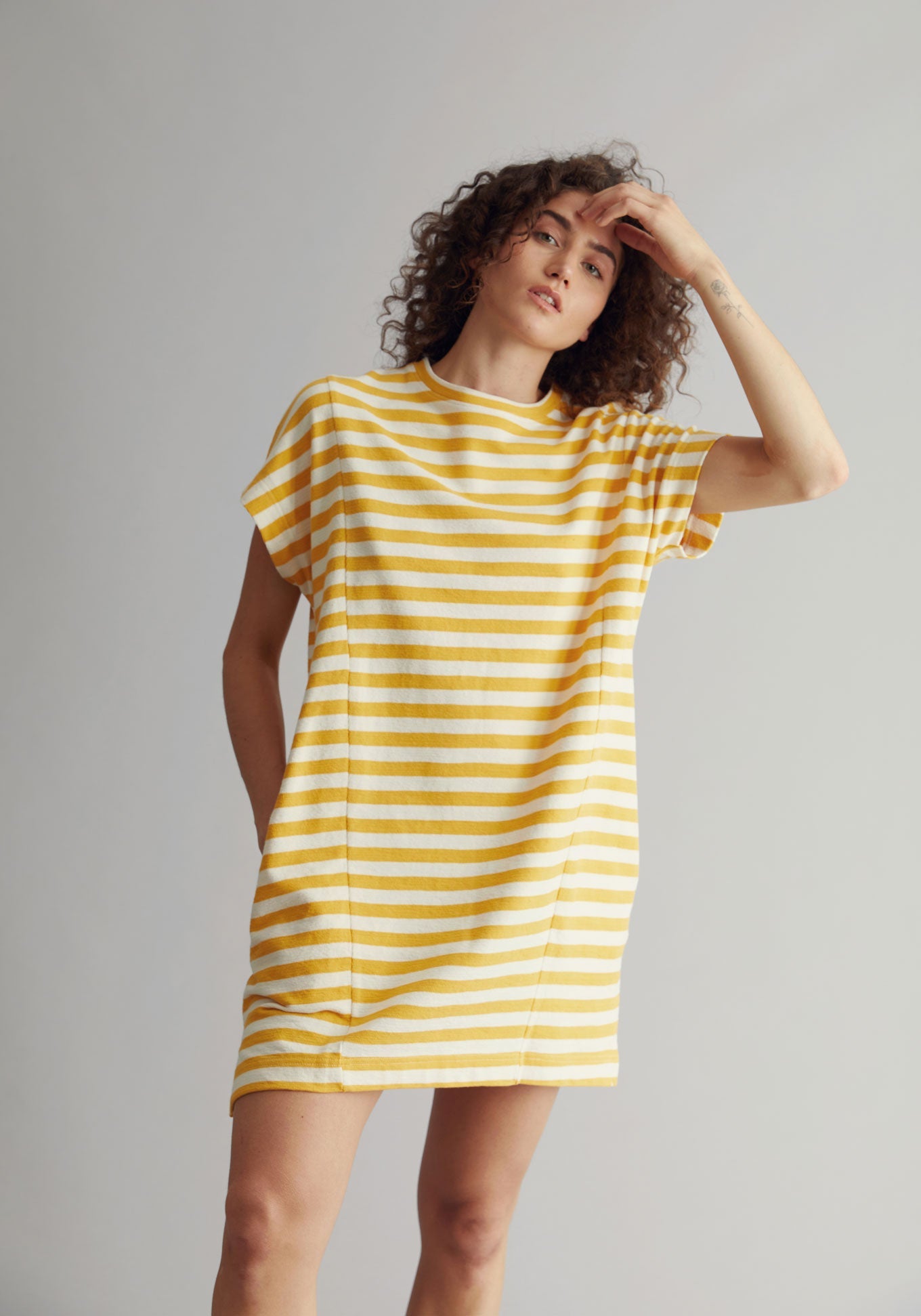 Yellow and white striped, short-sleeved dress YASUKO made of organic cotton by Komodo