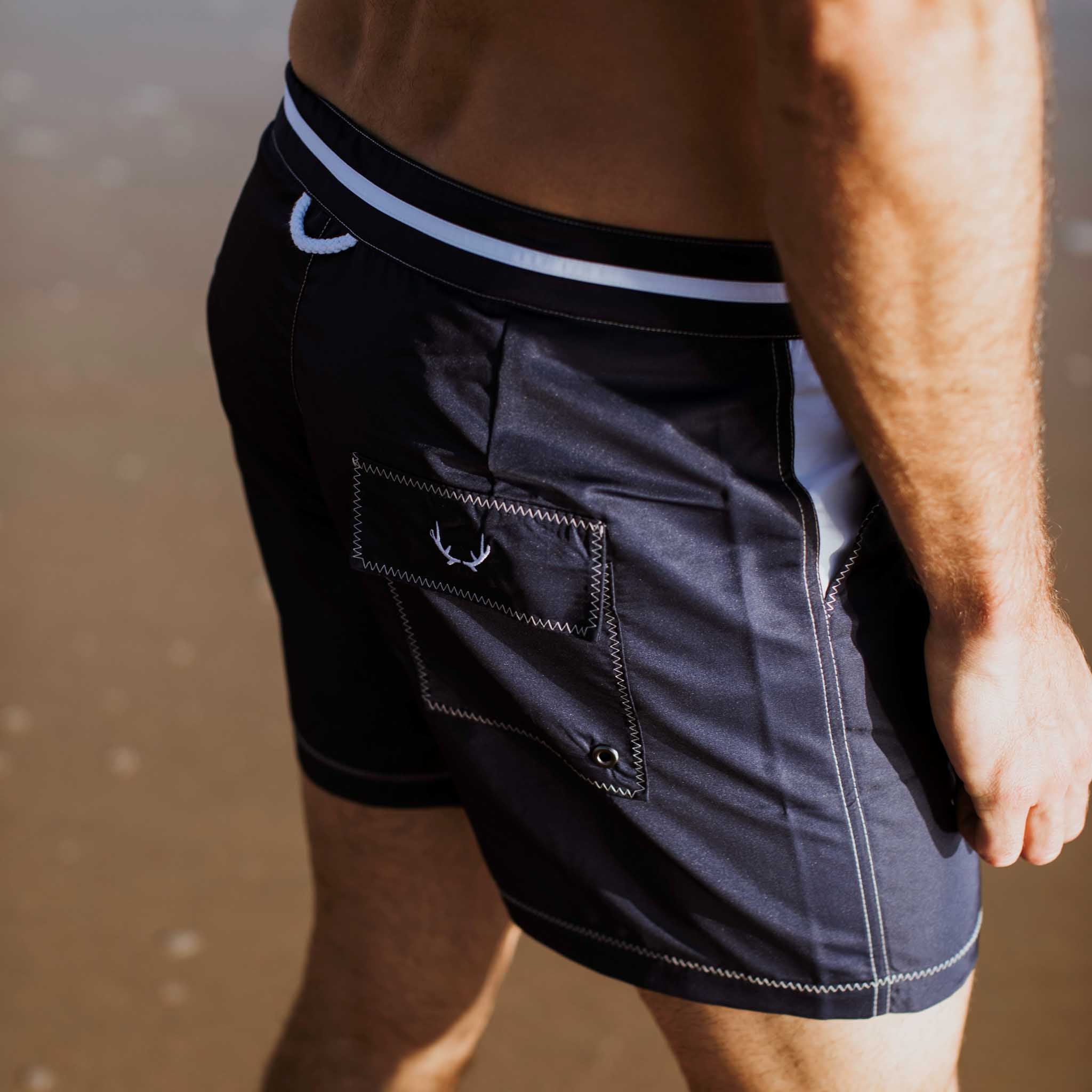 Blue swim shorts made from recycled polyester from Bluebuck