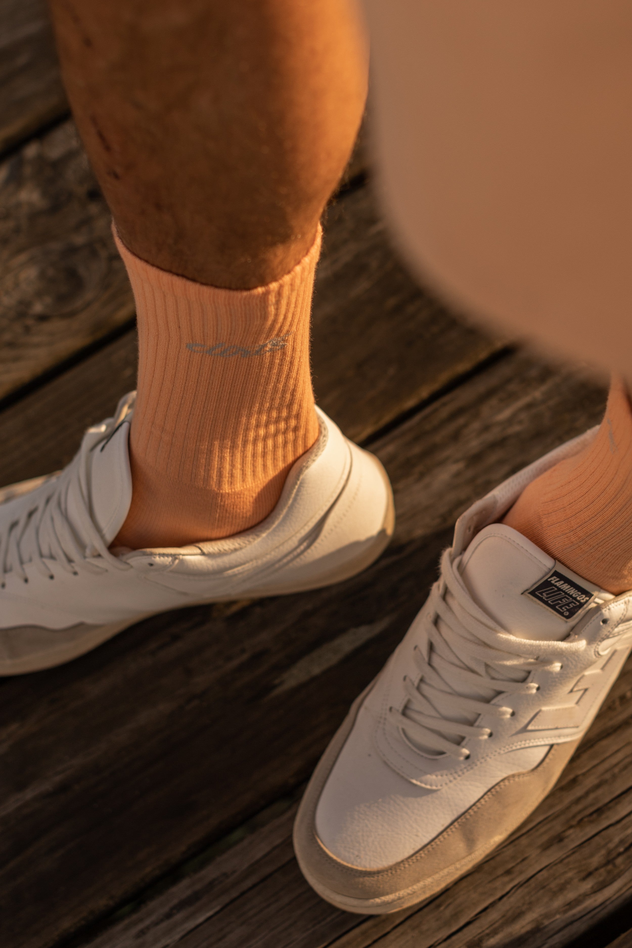 Light orange Classic Logo socks made of organic cotton from DIRTS