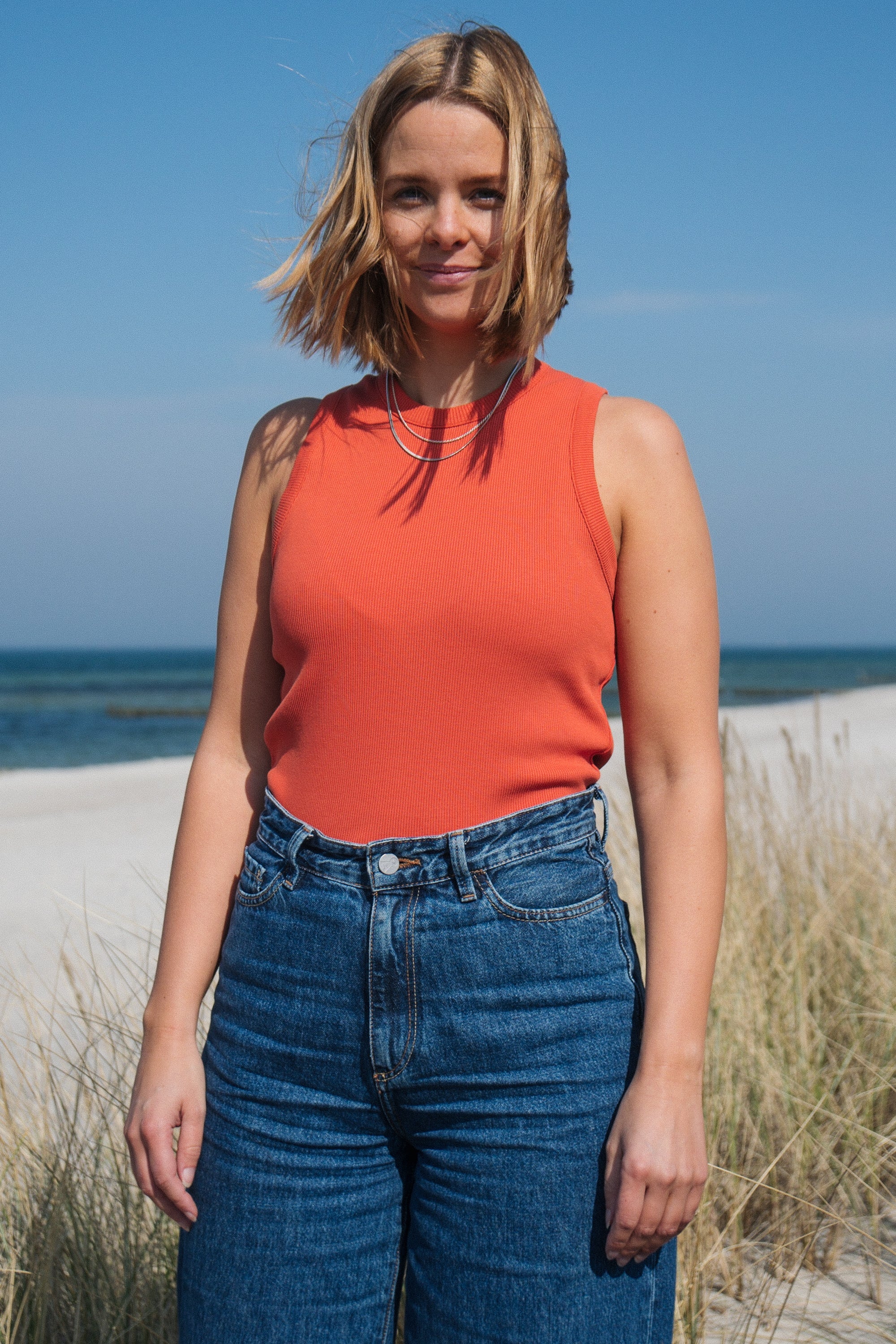 Top Alva Orange by Saltwater made from organic cotton
