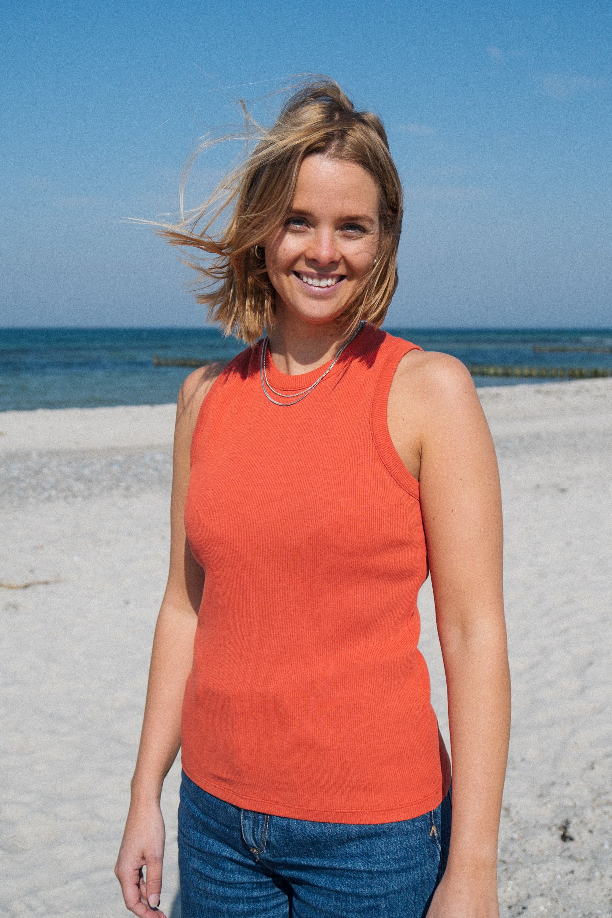Top Alva Orange by Saltwater made from organic cotton